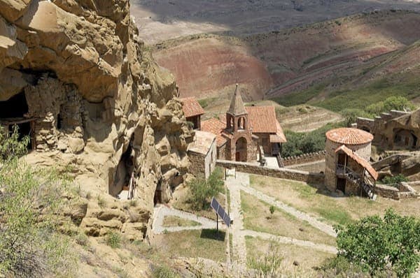 The Davit Gareja cave monastery terraced into a bare hillside in Georgia's semi-desert