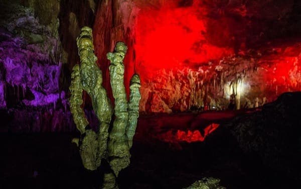 Illuminated rock formations inside Prometheus Cave near Kutaisi, Georgia